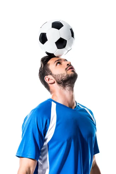 Handsome soccer player with ball on head Isolated On White — Stock Photo