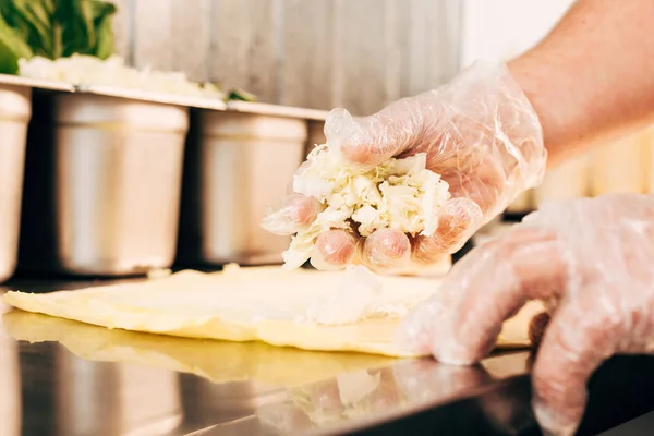 Partial view of cook in gloves preparing doner kebab — Stock Photo