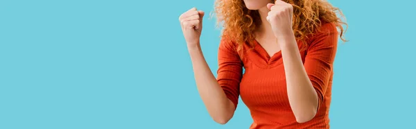 Cropped view of beautiful successful girl isolated on blue — Stock Photo