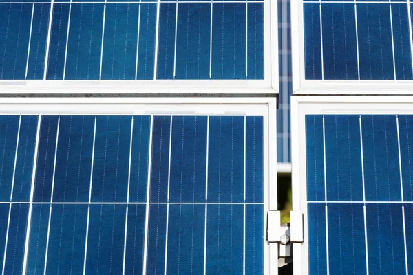 Blue solar energy batteries with copy space outside — Stock Photo