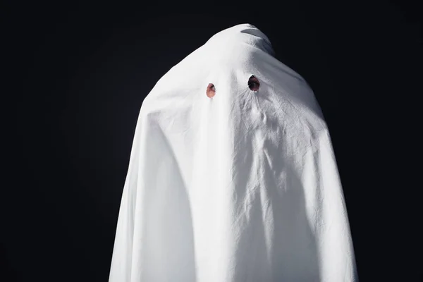 Fantasma horrível em lençol branco isolado no preto — Fotografia de Stock