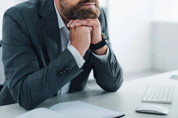 Cropped view of businessman in formal wear in office — Stock Photo