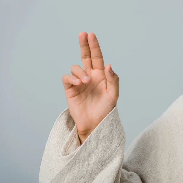 Close up of religious man gesturing isolated on grey — Stock Photo