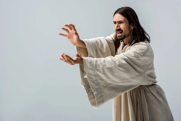 Scared religious man gesturing isolated on grey — Stock Photo
