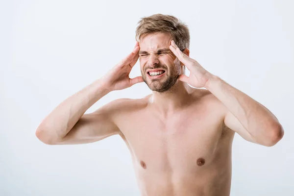 Shirtless man with headache touching temples isolated on grey — Stock Photo