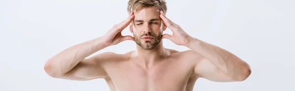 Panoramic shot of shirtless man with migraine touching temples isolated on grey — Stock Photo