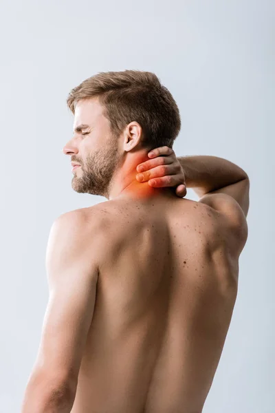 Shirtless bearded man with neck pain isolated on grey — Stock Photo