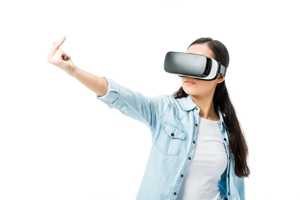 Woman in denim shirt with virtual reality headset showing middle finger isolated on white — Stock Photo