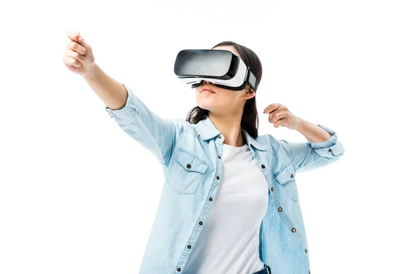 Woman in denim shirt with virtual reality headset  pulling on isolated on white — Stock Photo