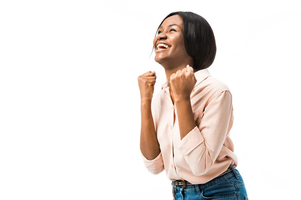 Smiling african american woman showing yes gesture isolated on white — Stock Photo