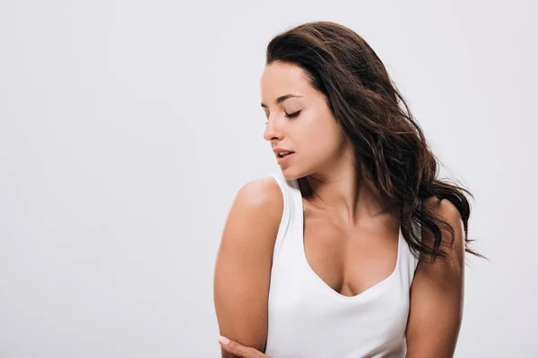 Brunette beautiful woman with closed eyes, long healthy and shiny hair isolated on grey — Stock Photo