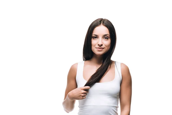 Брюнетка красивая женщина с длинными прямыми здоровыми и блестящими волосами изолированы на белом — стоковое фото