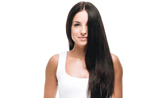 Mulher bonita morena com cabelo longo e reto saudável e brilhante isolado no branco — Fotografia de Stock