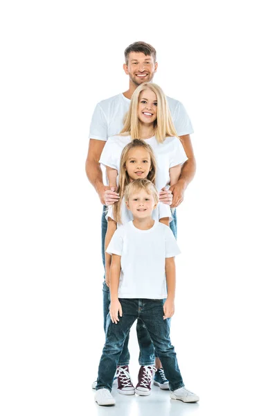 Adorable children and happy parents looking at camera on white — Stock Photo