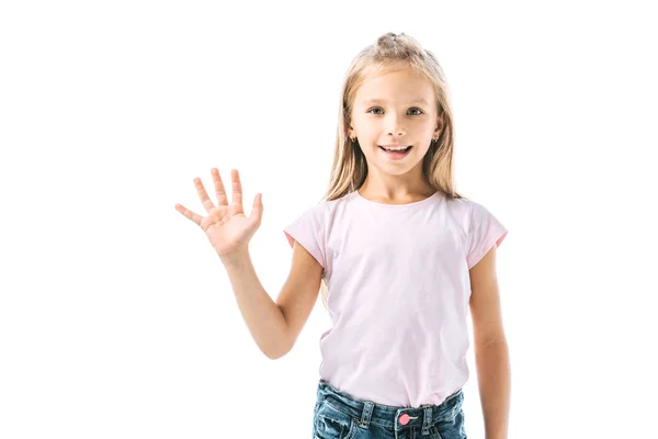 Niño feliz saludando de la mano y sonriendo aislado en blanco - foto de stock