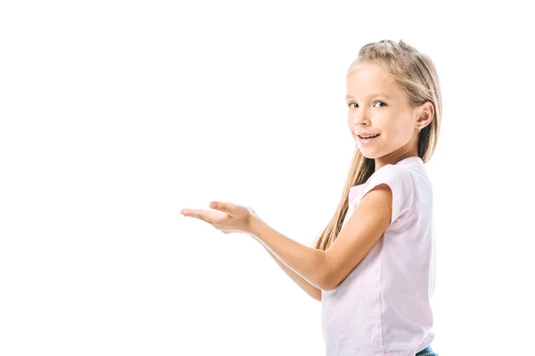 Positive and cute kid pointing with hands isolated on white — Stock Photo