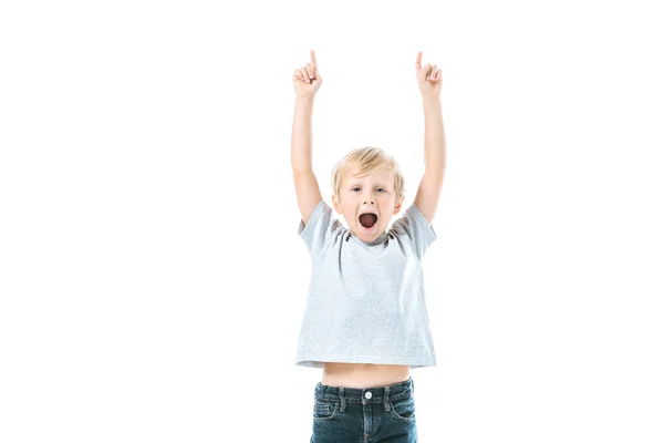 Excited kid with opened mouth pointing with fingers isolated on white — Stock Photo