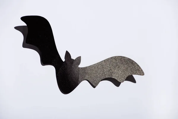 Pipistrello di carta nera su sfondo bianco — Foto stock