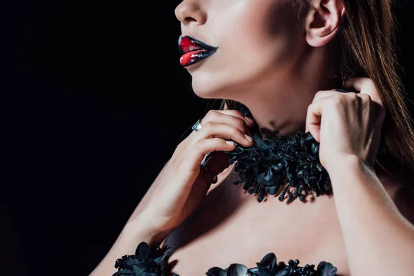 Cropped view of scary vampire girl in black gothic dress isolated on black — Stock Photo