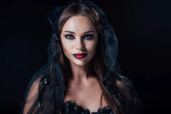 Scary vampire girl in black gothic dress and veil isolated on black — Stock Photo