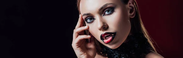 Panoramic shot of scary vampire girl with fangs — Stock Photo