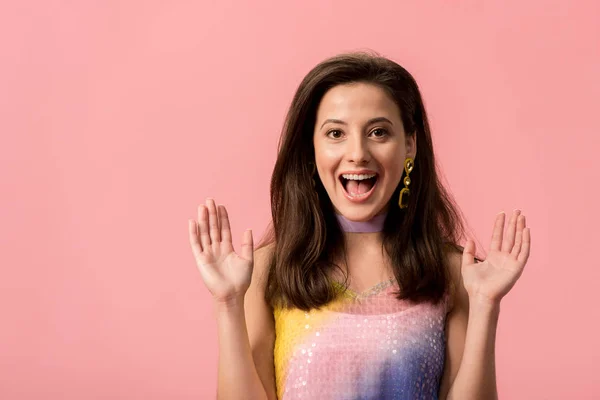 Excited young stylish disco girl with open mouth isolated on pink — Stock Photo