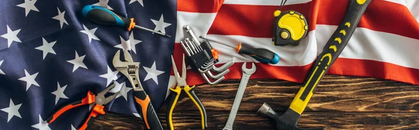 Panoramic orientation of instruments on american flag, labor day concept — Stock Photo