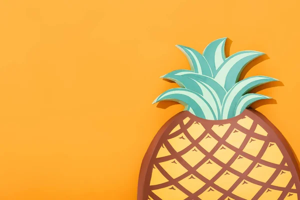 Paper cut pineapple on orange, summer concept — Stock Photo