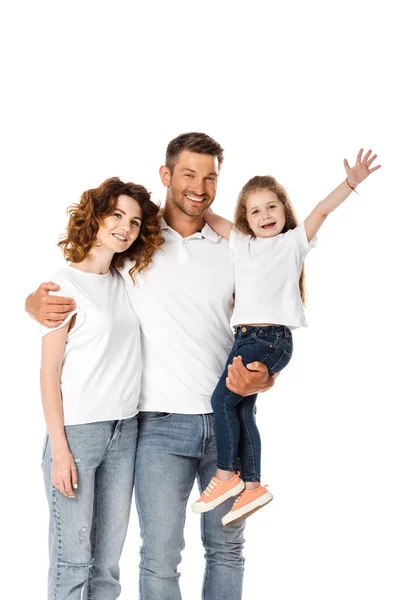 Feliz padre sosteniendo en brazos linda hija y abrazando rizado esposa aislado en blanco - foto de stock