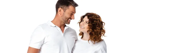 Panoramic concept of happy husband and wife looking at each other isolated on white — Stock Photo