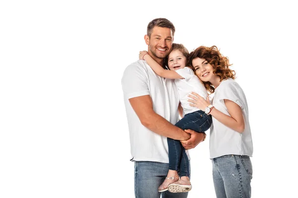 Cheerful mother and daughter hugging man isolated on white — Stock Photo