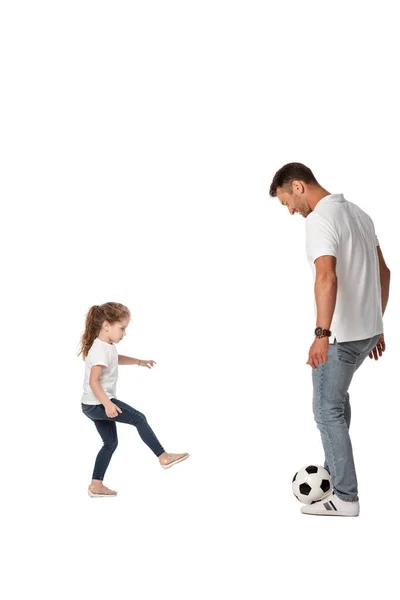 Felice padre giocare a calcio con carino figlia isolato su bianco — Foto stock