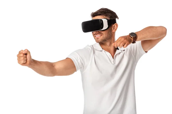 Cheerful man in virtual reality headset gesturing isolated on white — Stock Photo