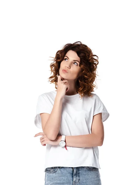 Pensive woman looking away and touching face isolated on white — Stock Photo