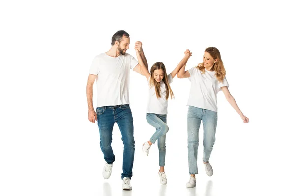 Happy casual family holding hands while walking isolated on white — Stock Photo