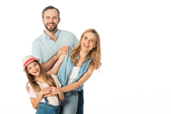 Familia feliz sonriendo a la cámara aislada en blanco - foto de stock