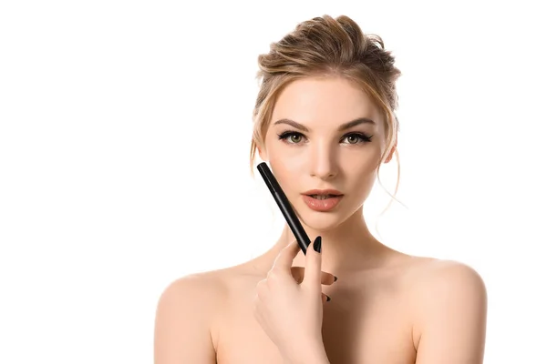 Naked beautiful blonde woman with makeup and black nails holding mascara isolated on white — Stock Photo