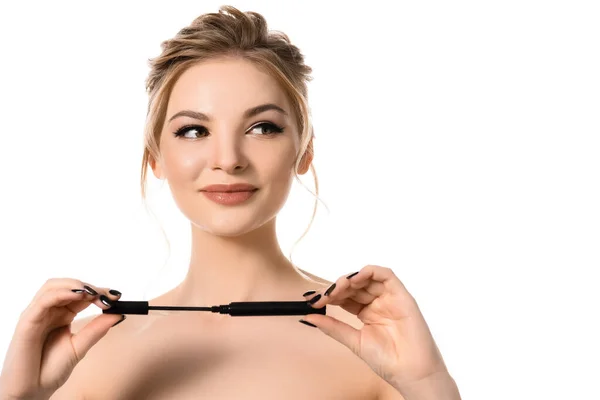 Smiling naked beautiful blonde woman with makeup and black nails holding mascara isolated on white — Stock Photo