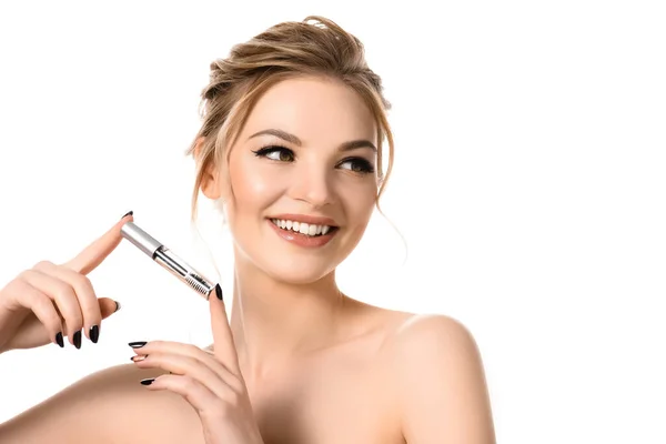 Smiling naked beautiful blonde woman holding clear brow gel isolated on white — Stock Photo