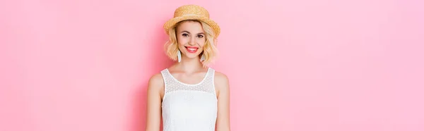 Panoramic orientation of young woman in straw hat on pink — Stock Photo