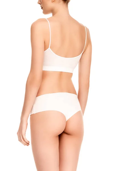 Abgeschnittene Ansicht einer jungen Frau mit perfektem Körper isoliert auf Weiß — Stockfoto