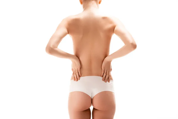 Vue partielle de la jeune femme en culotte debout avec les mains sur les hanches isolées sur blanc — Photo de stock