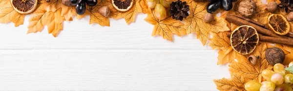 Top view of autumnal decoration on white wooden background, panoramic shot — Stock Photo