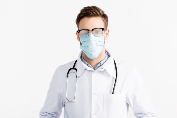 Front view of doctor with steamed eyeglasses and medical mask isolated on white — Stock Photo