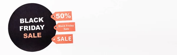 Website header of price tags and black circle with black friday sale lettering on white background — Stock Photo