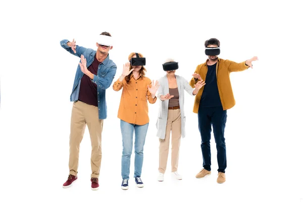 Men and women in casual clothes using vr headsets isolated on white — Stock Photo