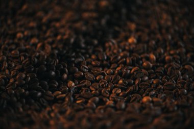 Brown aromatic roasted coffee beans texture clipart
