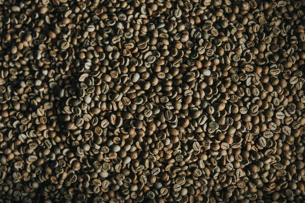 Ruwe Koffiebonen Verloop Van Roosteren Textuur — Stockfoto