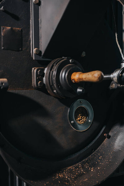 Adjusting handle of machine for professional coffee production