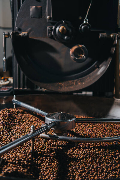 Roasting coffee beans in large professional coffee roaster
